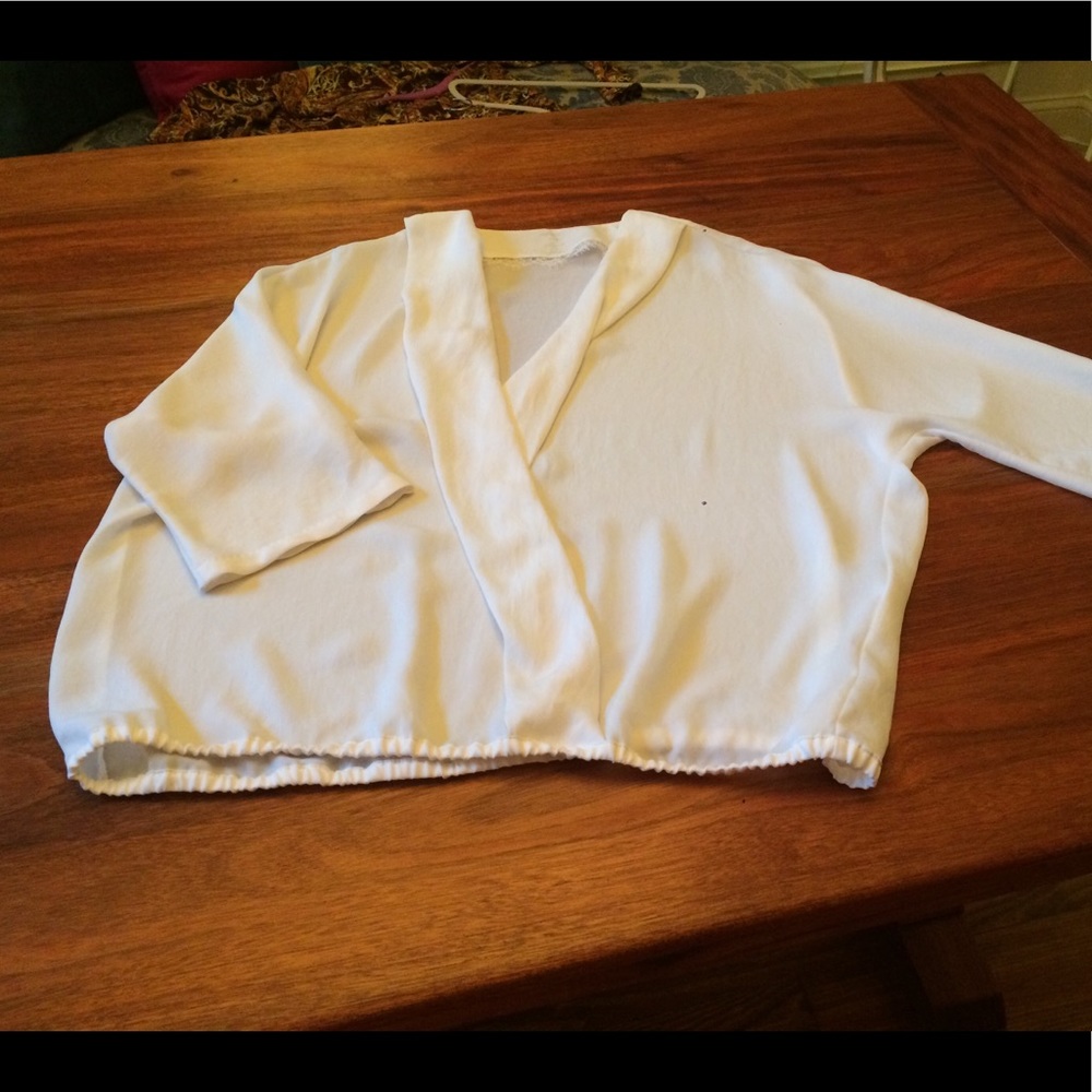 Beautiful low v-neck blouse.